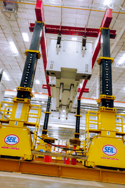 Assembly of 1,000 ton crown press machinery using 500 ton hydraulic frame.